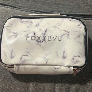 FoxyBae travel mini hair dryer and straightener in travel bag